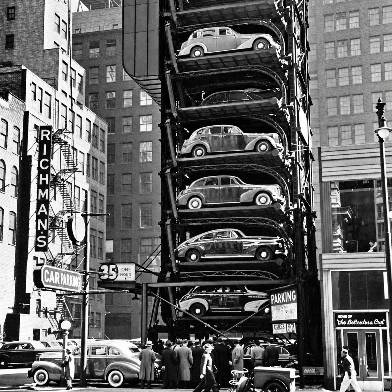 A 1940s multi-level car stacker on a city street, from Parkmatic’s early years
