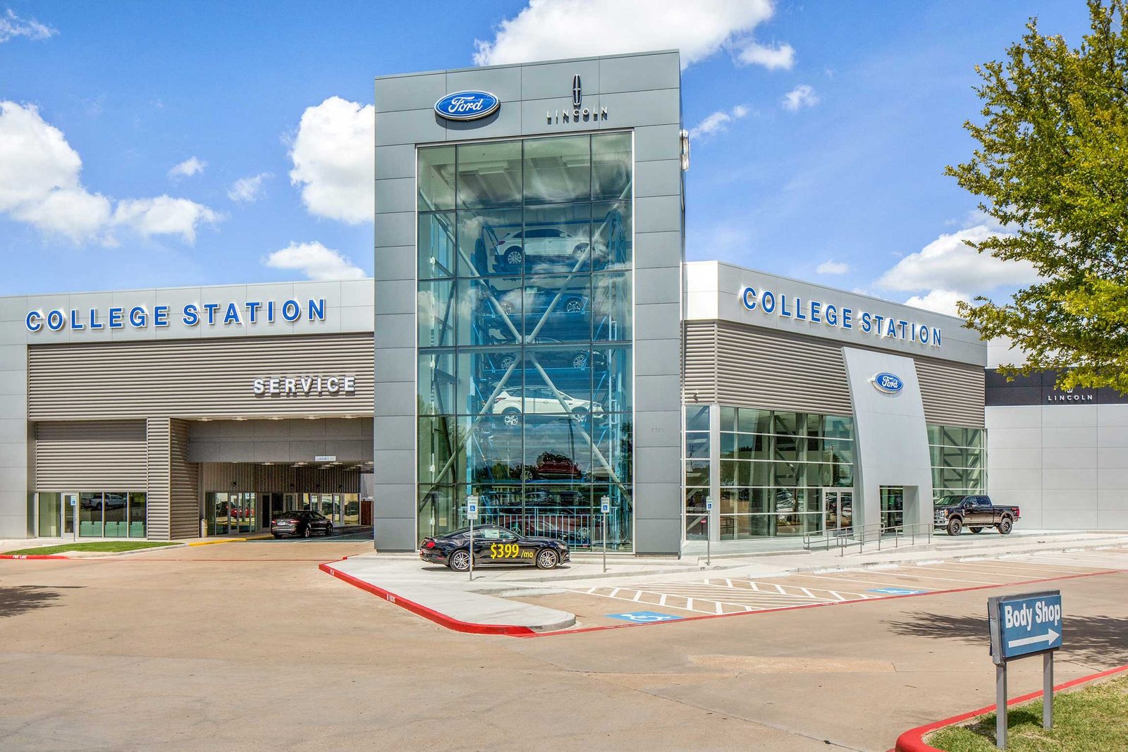 A Carousel tower built into the front of a vehicle dealership in College Station, Texas