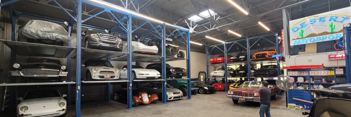 Triple stacker holding three vehicles in a single parking bay