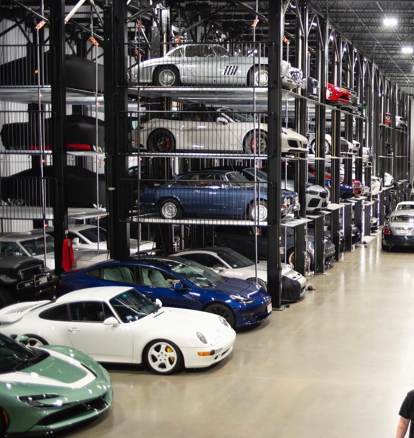 Classic sports cars stacked four high in Acton