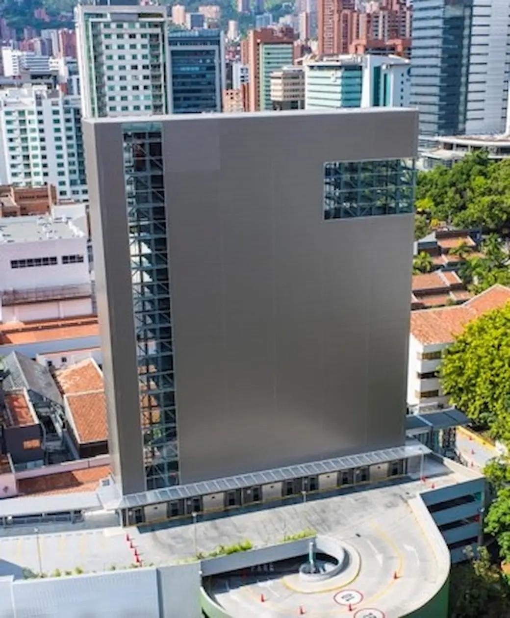 A Tower parking system seen from above among neighbouring buildings