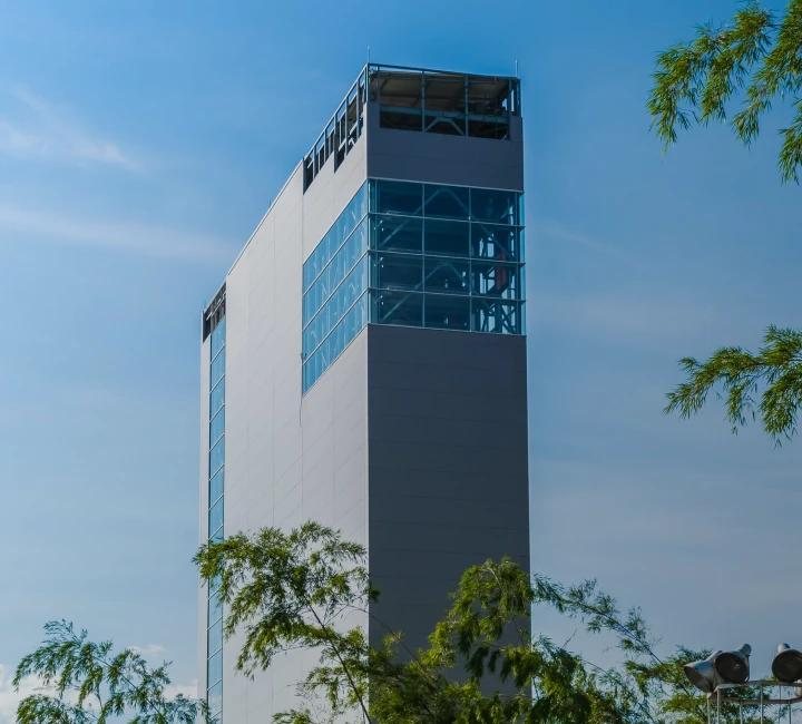 The full height of a Tower parking system viewed from the street